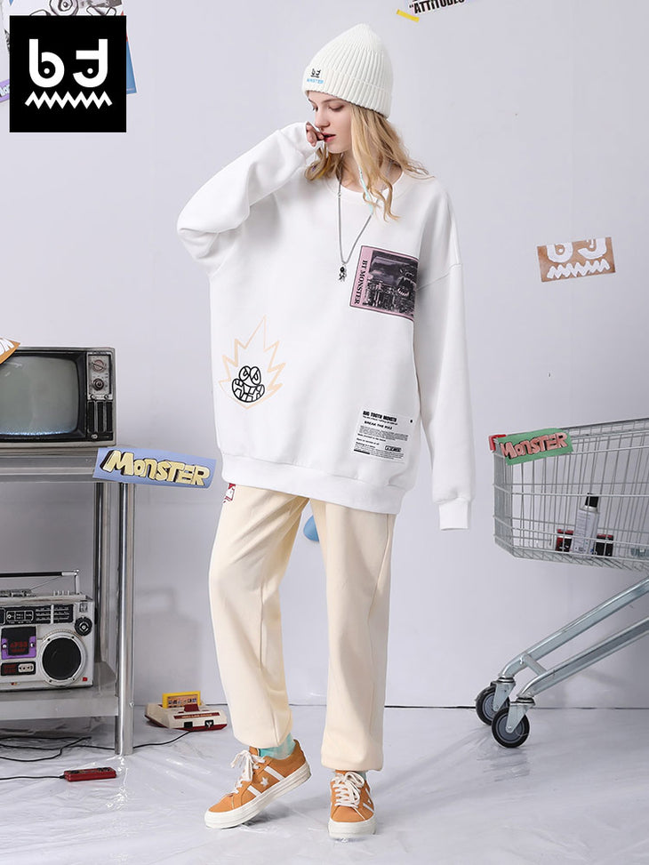 Cotton sweatpants with graffitied elastic mid-rise waist and loose legs