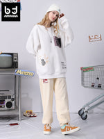 Cotton sweatpants with graffitied elastic mid-rise waist and loose legs