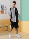 Black and white contrast side stripe letter print baggy quarter shorts with multiple pockets
