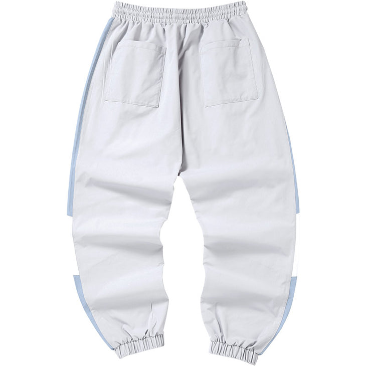 Grey, white and blue patchwork printed drawstring elasticated waist ankle tracksuit pants