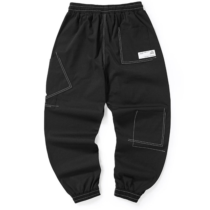 Plain Label Asymmetric Pocket Drawstring Casual Pants